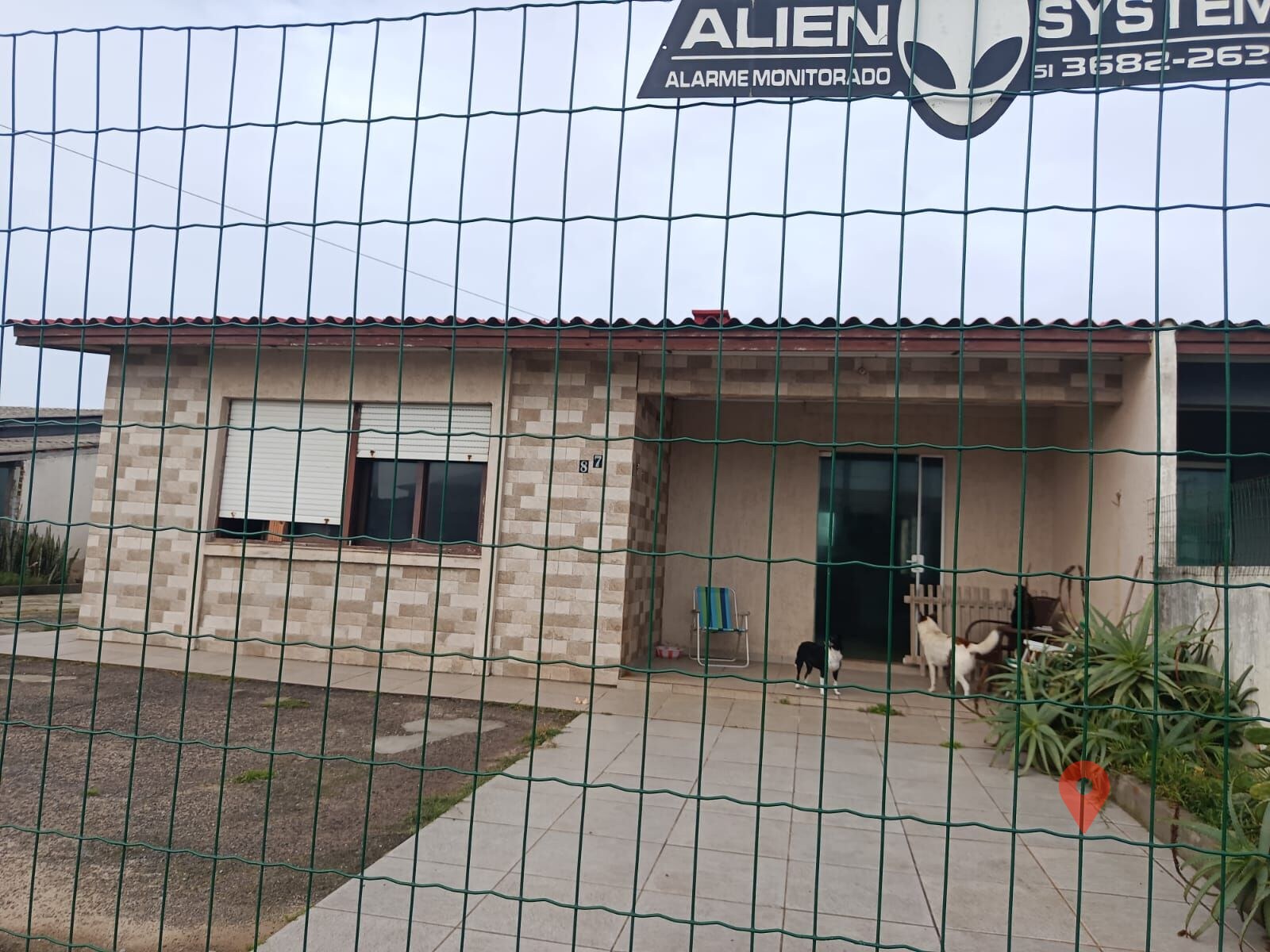 Casa à venda no bairro Centro em Balneário Pinhal/RS — foto 1